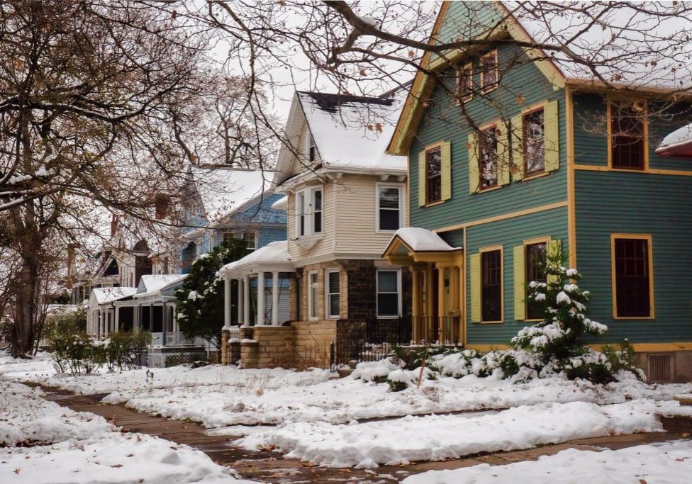 Quiet residential street after an autumn snowfall